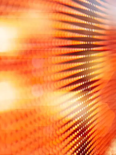 Abstract orange pattern of glowing lines and dots