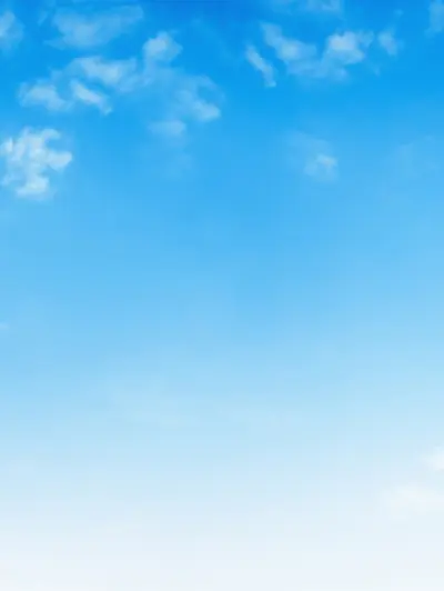 Clear blue sky with wispy clouds