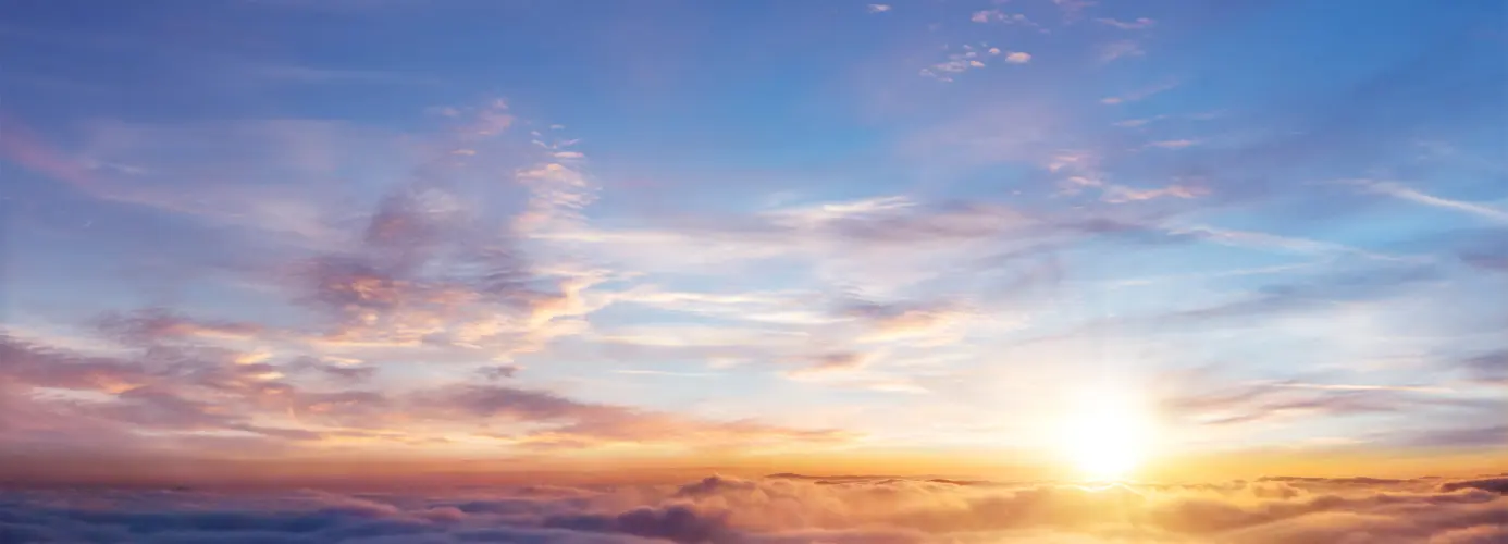 Colorful sunset sky with wispy clouds