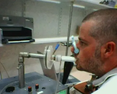 Scientist using breathing apparatus