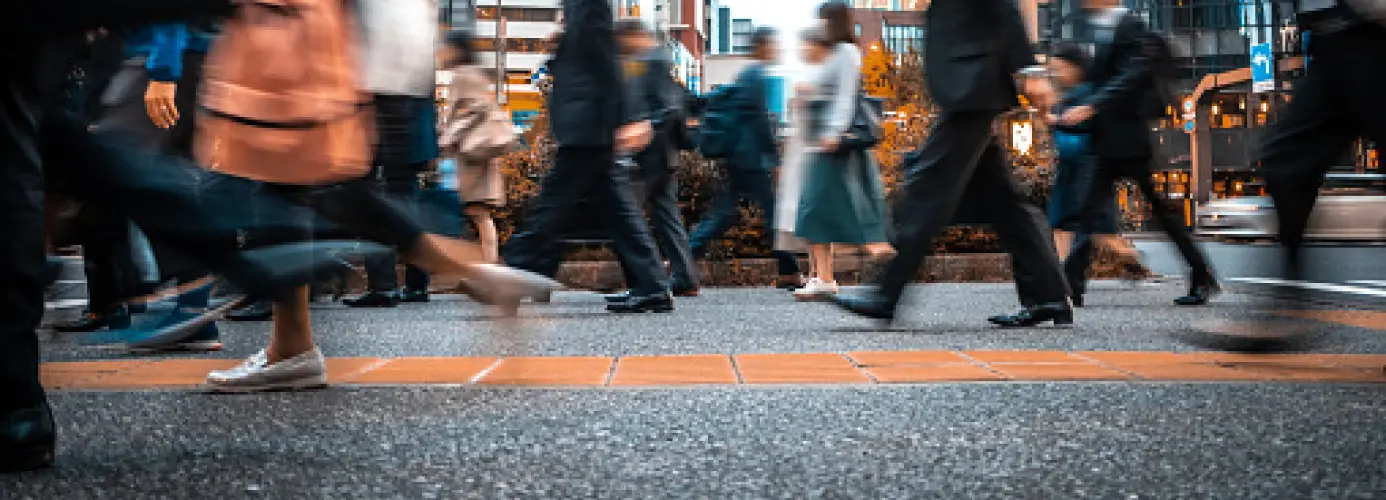 Blurred city street with pedestrians