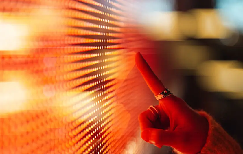 Vibrant orange LED light display in an abstract pattern