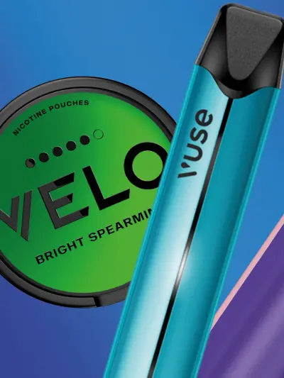 Close-up of nicotine products: a green Velo pouch container labeled 'Bright Spearmint' and a blue vaping device against a colorful background.