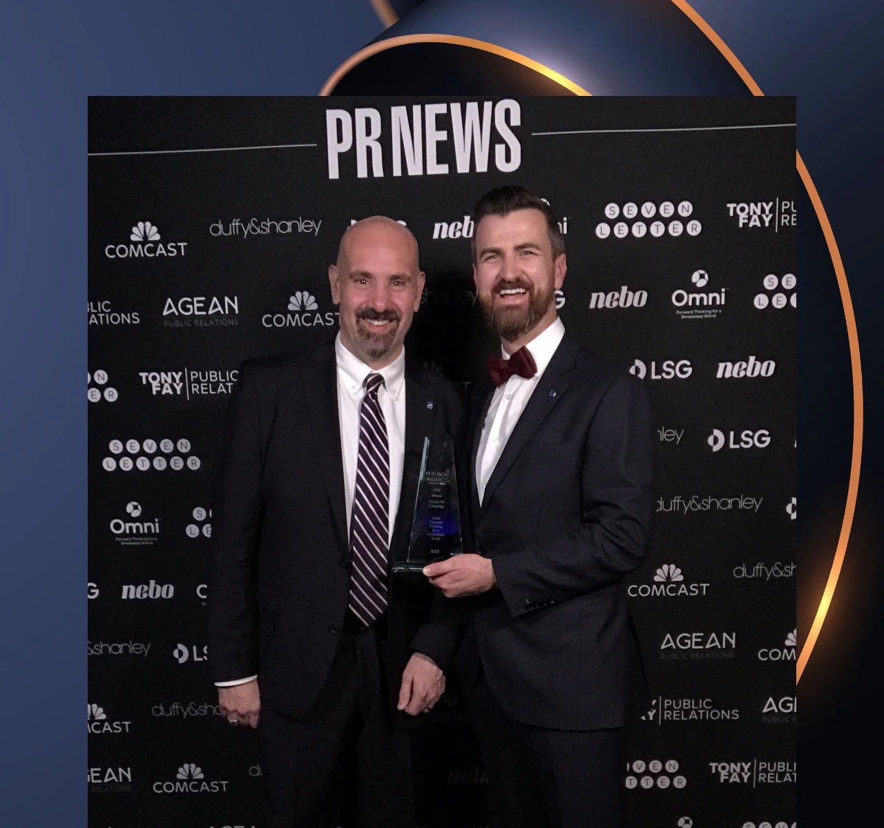 Arthur Janoyan and Mark Forster, BAT, collecting the award